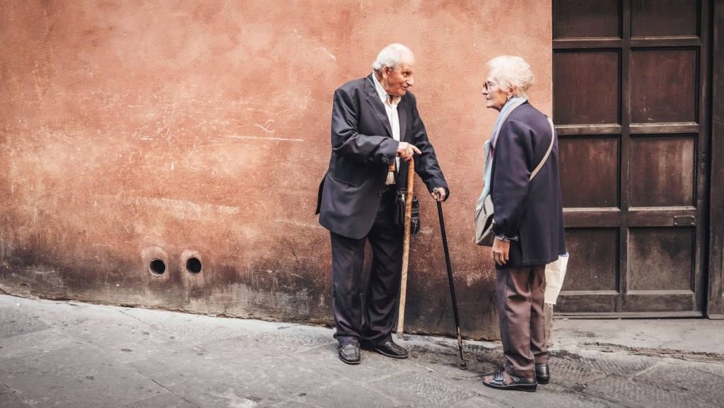 two people in conversation